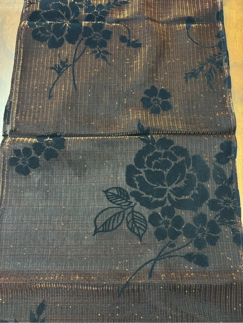 NWOT.  Casual Corner scarf - black with orange metallic threads